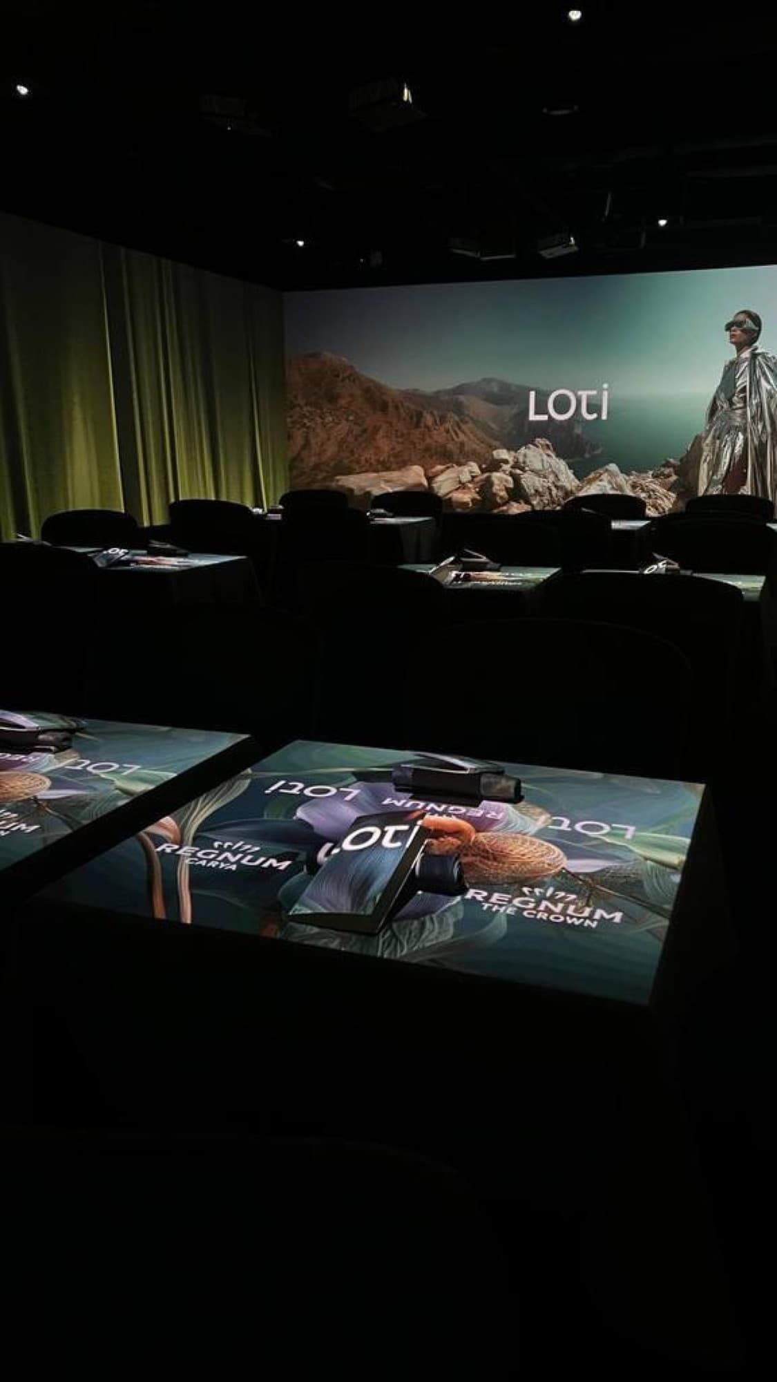 The intimate hall of the SVET gastronomic theatre in Moscow set for a foundation’s charity evening
